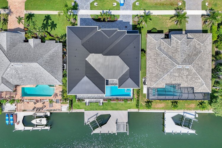 The house from directly above: roof, pool and dock.